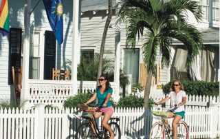 Two women biking in Key West