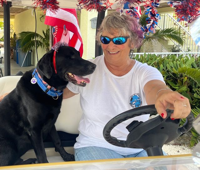 Lewis spends as much time as she can with her senior Labrador rescue, Burke. 