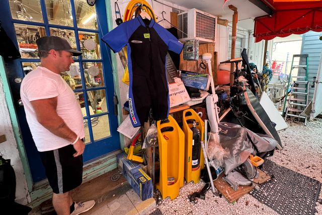 A customer surveys offerings at Mother Ocean.