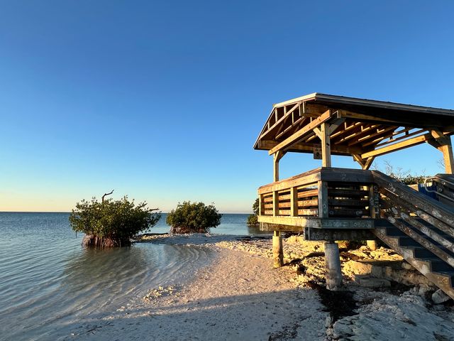 The oceanfront linear park at Anne's Beach features elevated shade structures along its 1,300-foot-long boardwalk. Photo: JoNell Modys