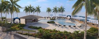A pool overlooking the ocean.