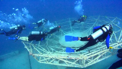 Divers explore above the Vandenberg's weighty superstructure. Photo by Haig Jacobs