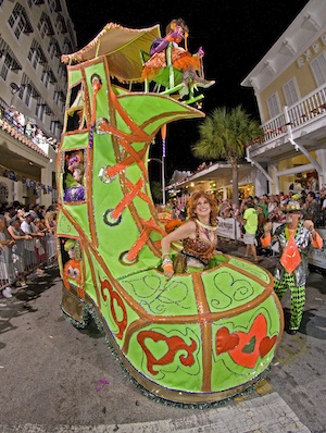 Susanne maneuvers her giant boot costume down Duval Street during a past Fantasy Fest Parade. (Photo by Andy Newman, Florida Keys News Bureau)
