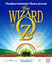 Wizard of Oz poster with rainbow and path leading to Emerald City.