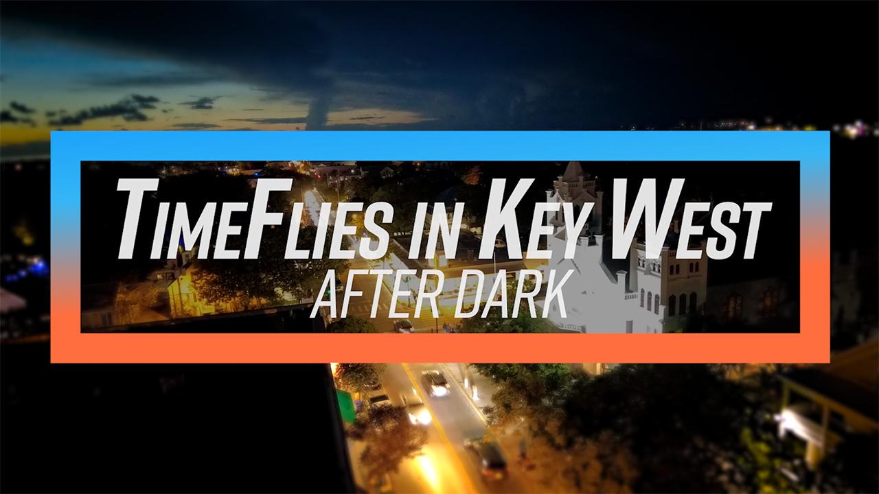 Text "Time Flies in Key West After Dark" over a cityscape at sunset.