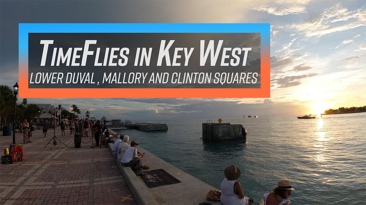 Sunset view over a Key West waterfront with people relaxing.