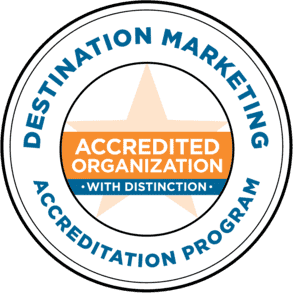 Accreditation program logo with star and circular design.