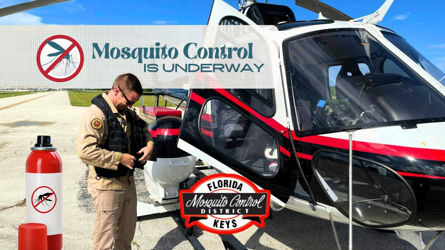 Helicopter on airstrip, person in uniform, mosquito control text and logos.