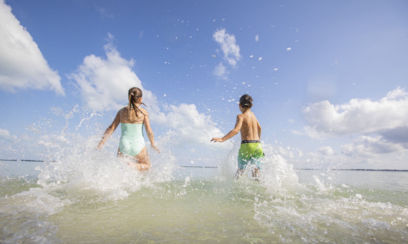 kids running in the water