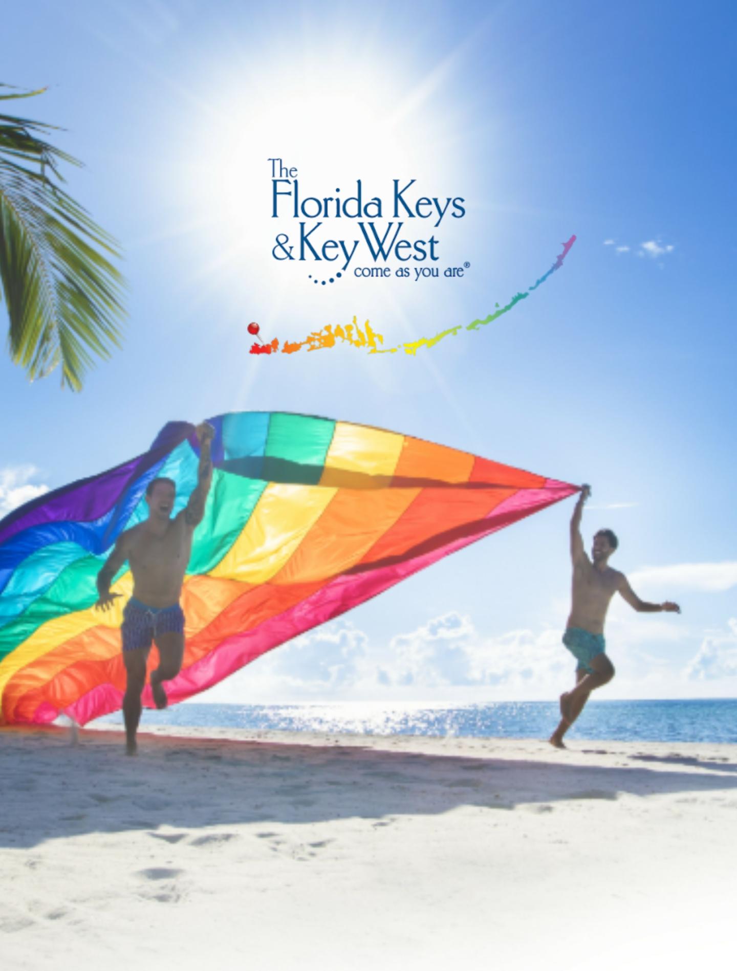 Florida Keys &amp; Key West logo above people flying a colorful kite on a beach.