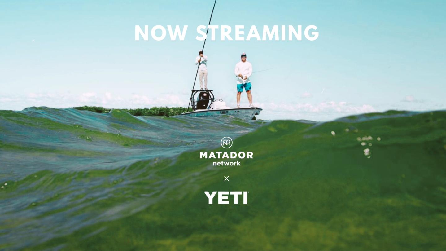 Surfer on a board in green waves beneath “Now Streaming” and Yeti logo.