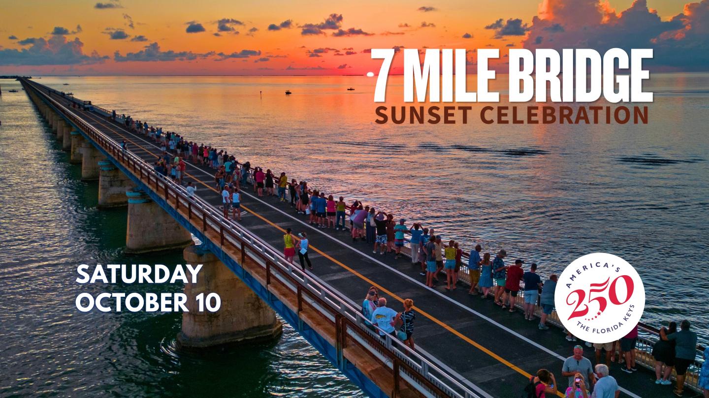 Crowds walk across the 7 Mile Bridge at sunset for a celebration.