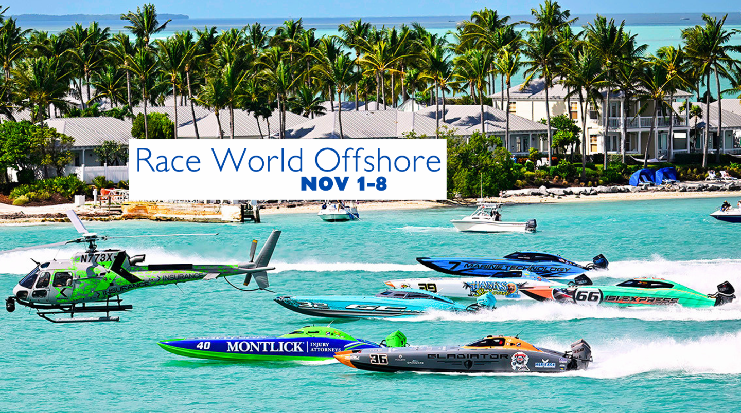 Race World Offshore speedboats racing near a tropical shoreline.
